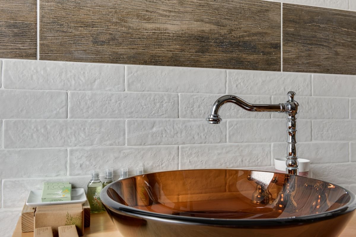 Chrome tap and basin detail, illustrative stock photograph